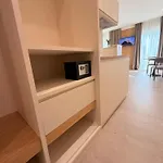 Ab *